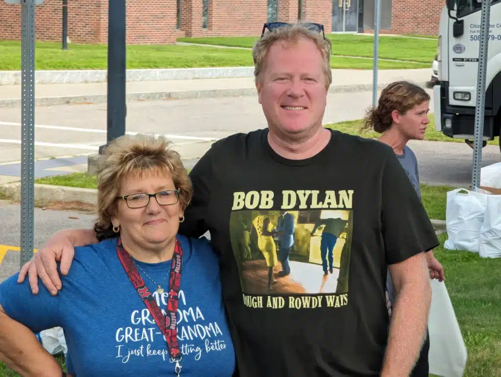 Smiles at Taunton Mobile Pantry two people smiling together at a food pantry event