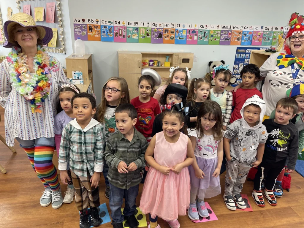 Head Start Kids Dress Up A classroom of head start children posing in cute outfits